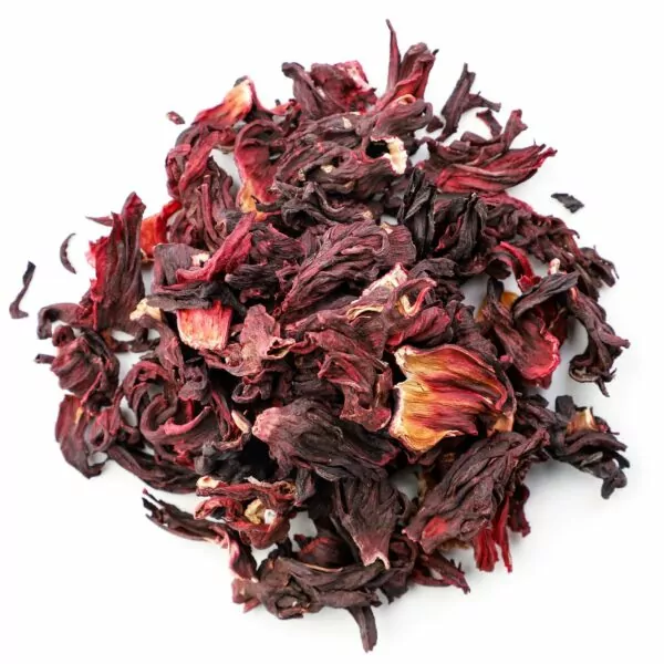 Heap of hibiscus tea on white background, isolated. The view from top